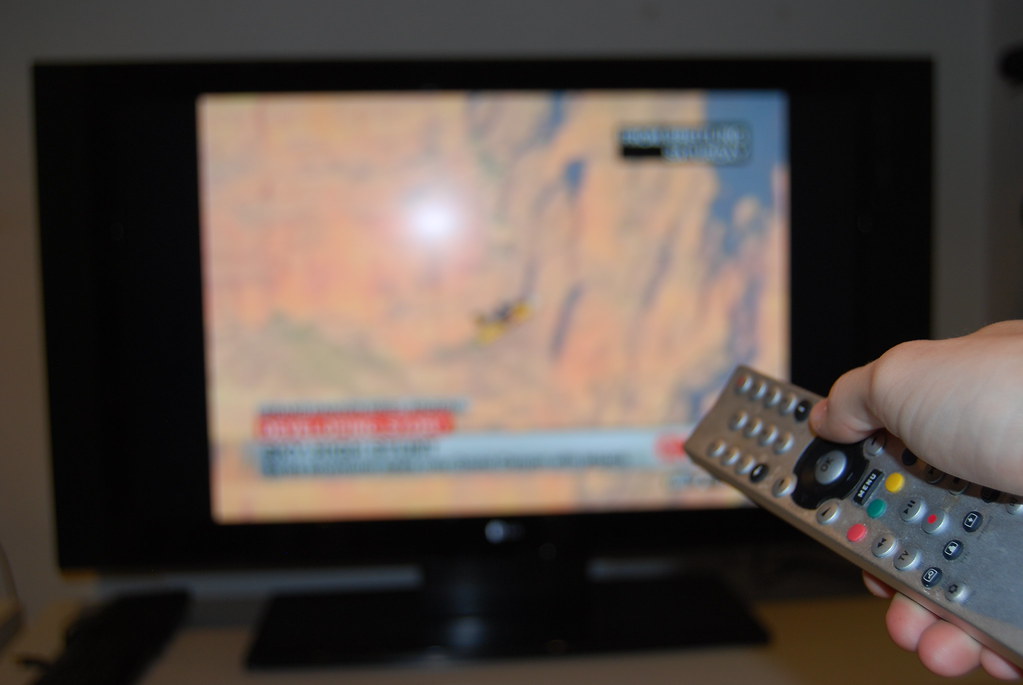 TV, Television and remote controller - stock photo